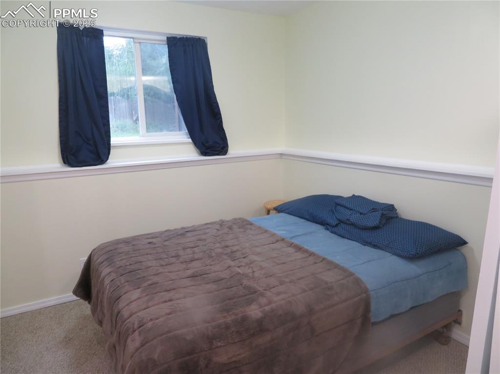 Image 36 of 39: Lower Bedroom with new carpet