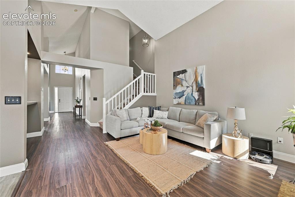 Image 8 of 45: Vaulted ceilings highlighting an open-concept design
