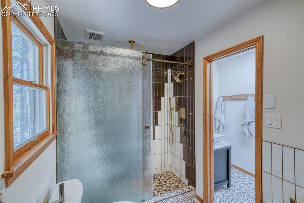 Image 18 of 50: Master Bathroom