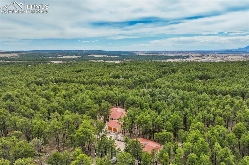 Image 2 of 50: Aerial view of the surrounding area