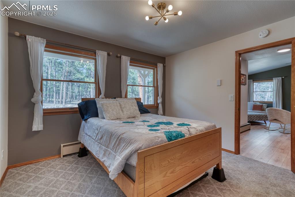 Image 21 of 50: Main level bedroom