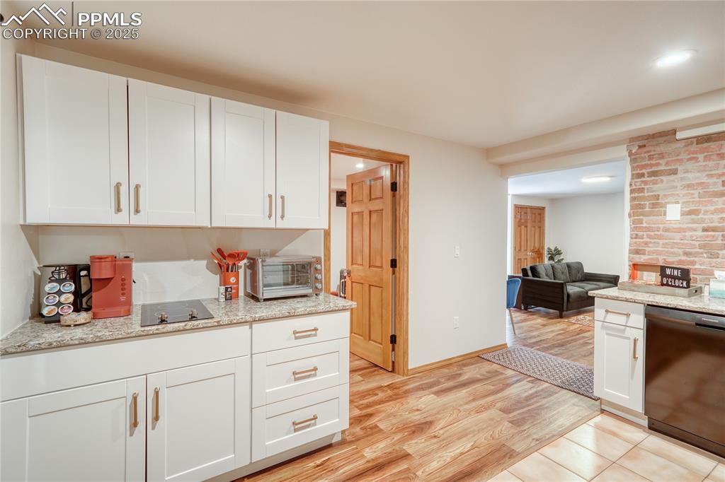 Image 24 of 50: Second kitchen in basement