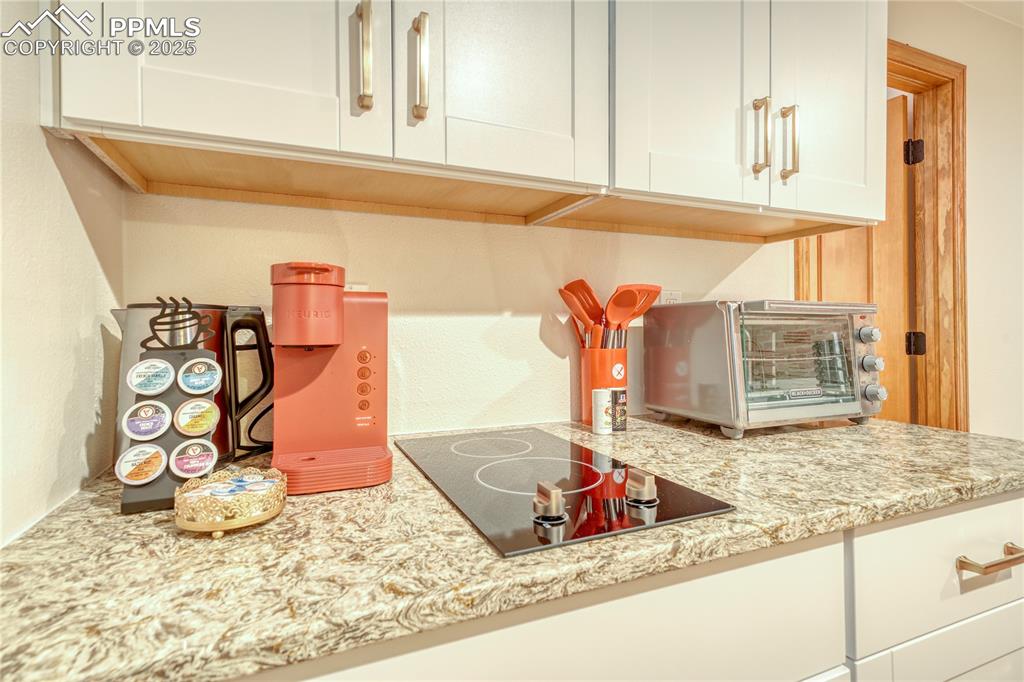 Image 25 of 50: Second kitchen in basement