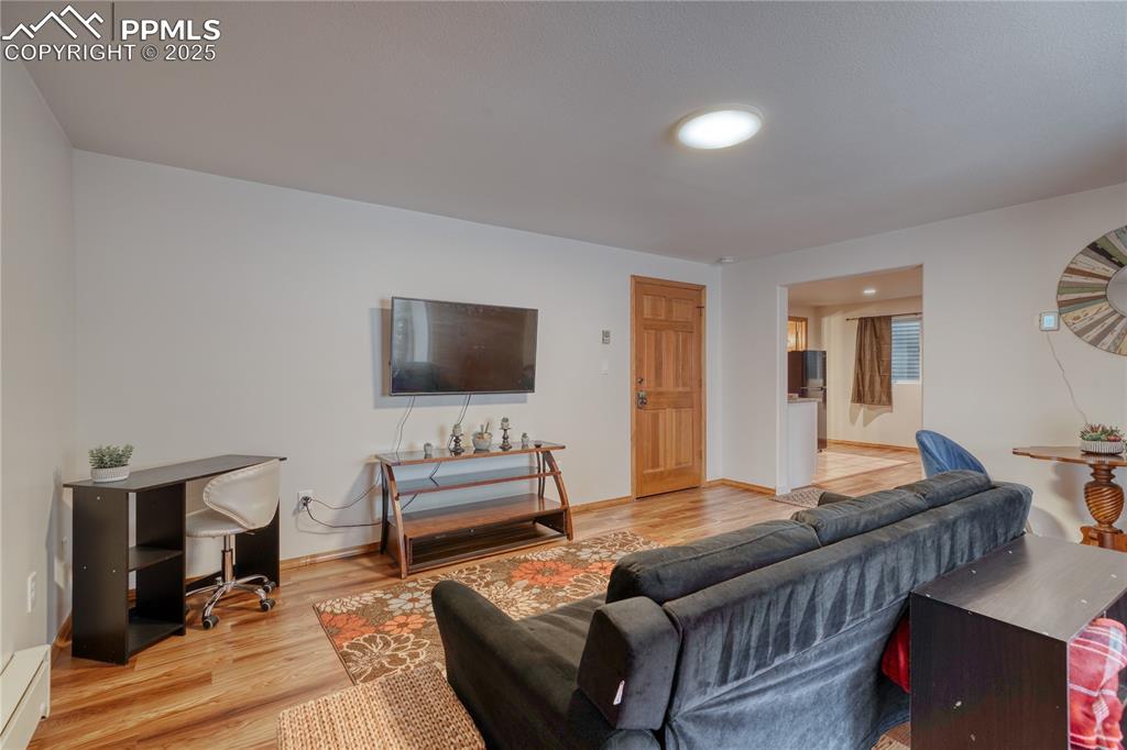 Image 27 of 50: Additional living area in the basement