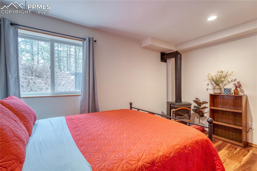 Image 29 of 50: Basement bedroom with garden level windows