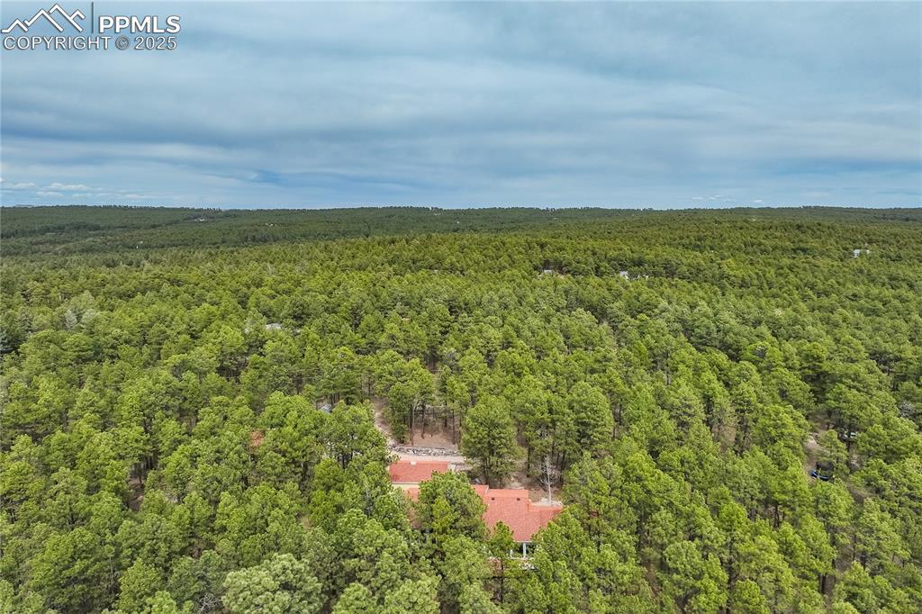 Image 49 of 50: Aerial view of the surrounding area