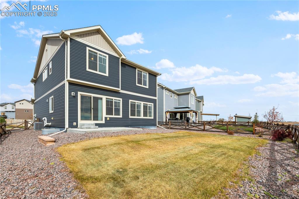 Image 22 of 39: Nice size concrete patio