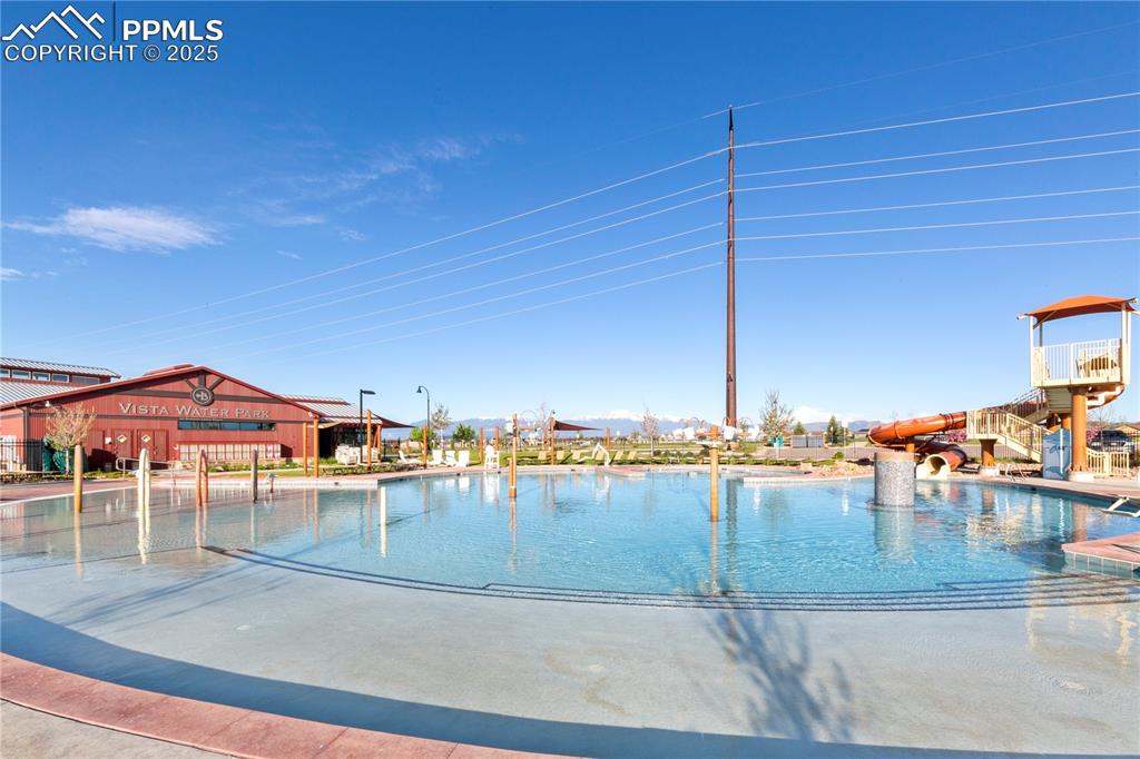 Image 35 of 39: Zero entry pool/splash park in the community