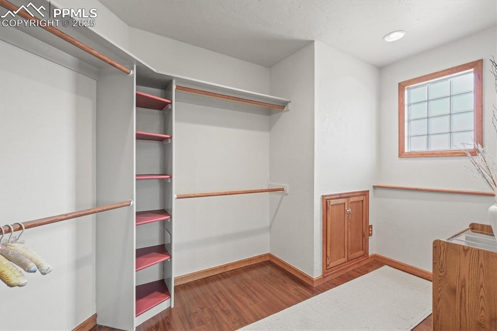 Image 38 of 49: Secondary master suite large walk in closet