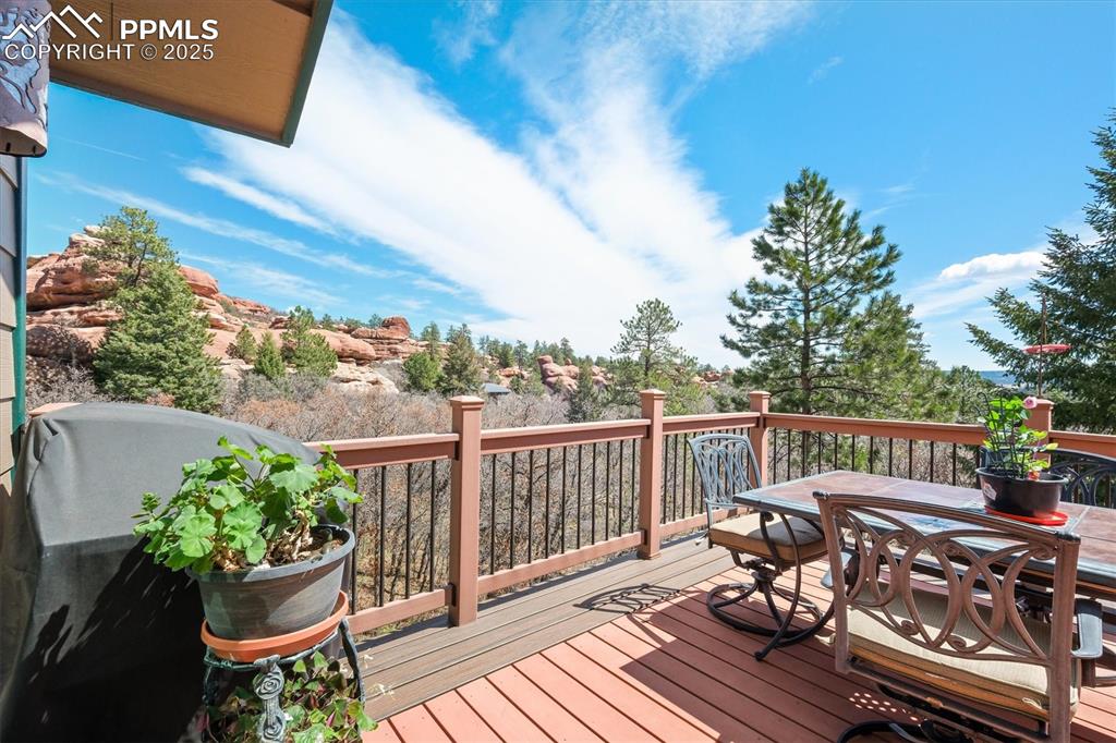Image 9 of 49: Upperdeck off the living room slider door with stunning views of the red ro