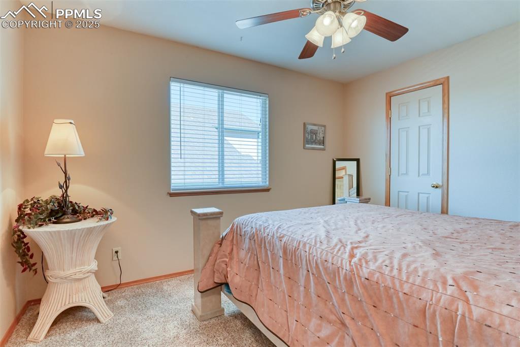 Image 29 of 39: bright 4th bedroom with walk-in closet