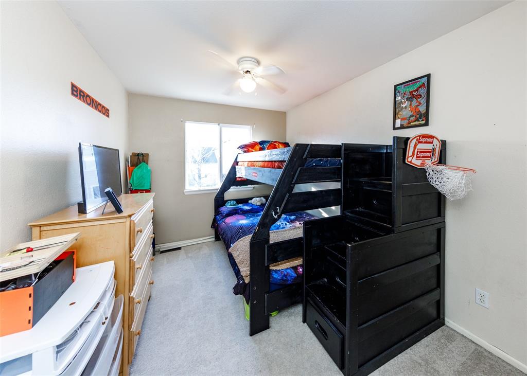Image 37 of 42: Bedroom featuring light carpet and ceiling fan
