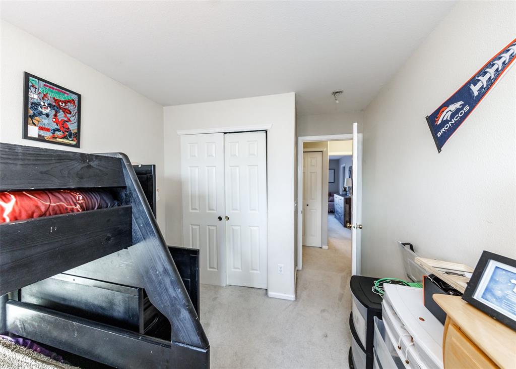 Image 38 of 42: Bedroom featuring light carpet and a closet