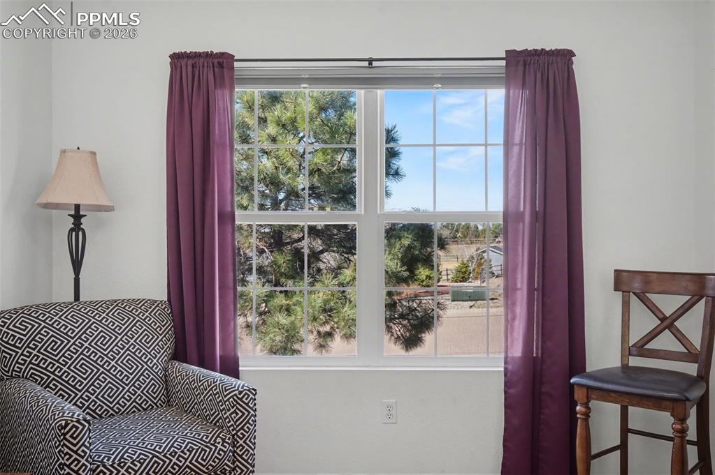 Image 38 of 48: Sitting room in primary bedroom