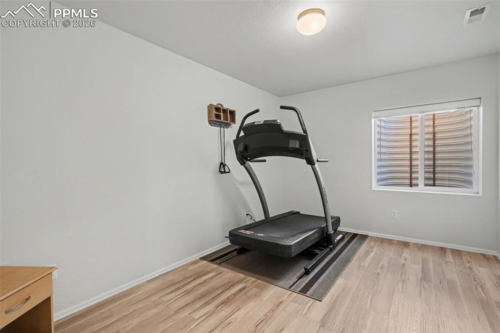 Image 45 of 48: Basement bedroom