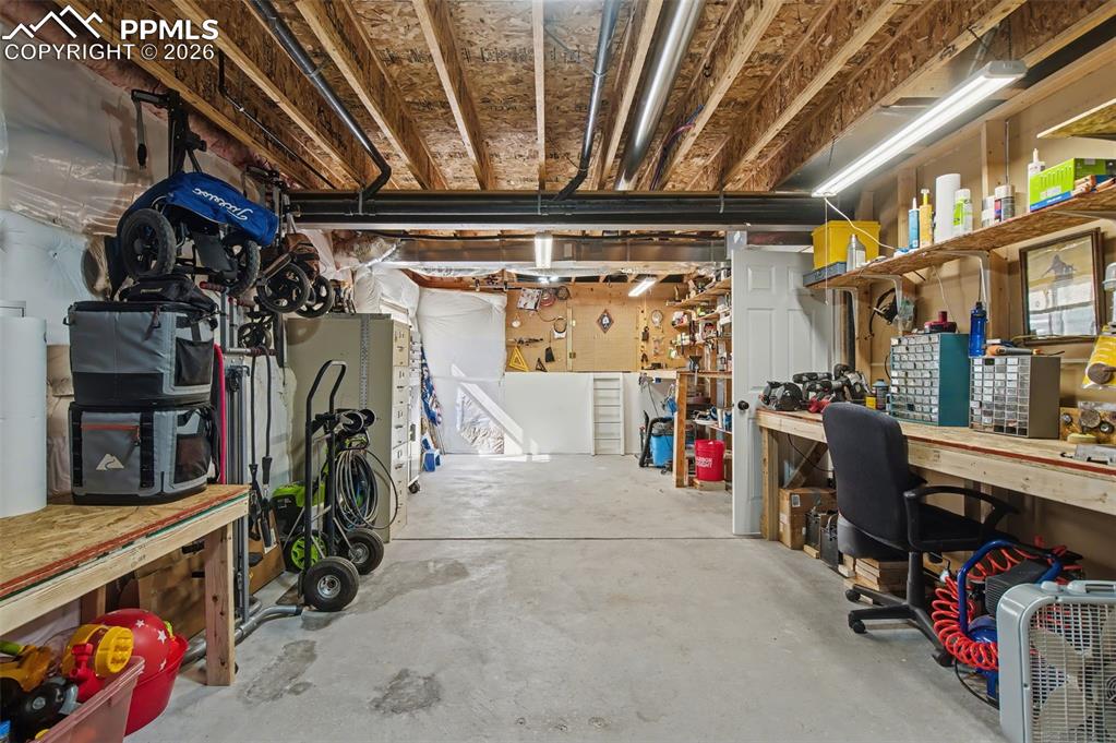 Image 46 of 48: Work Shop/Storage/ Could be 6th bedroom