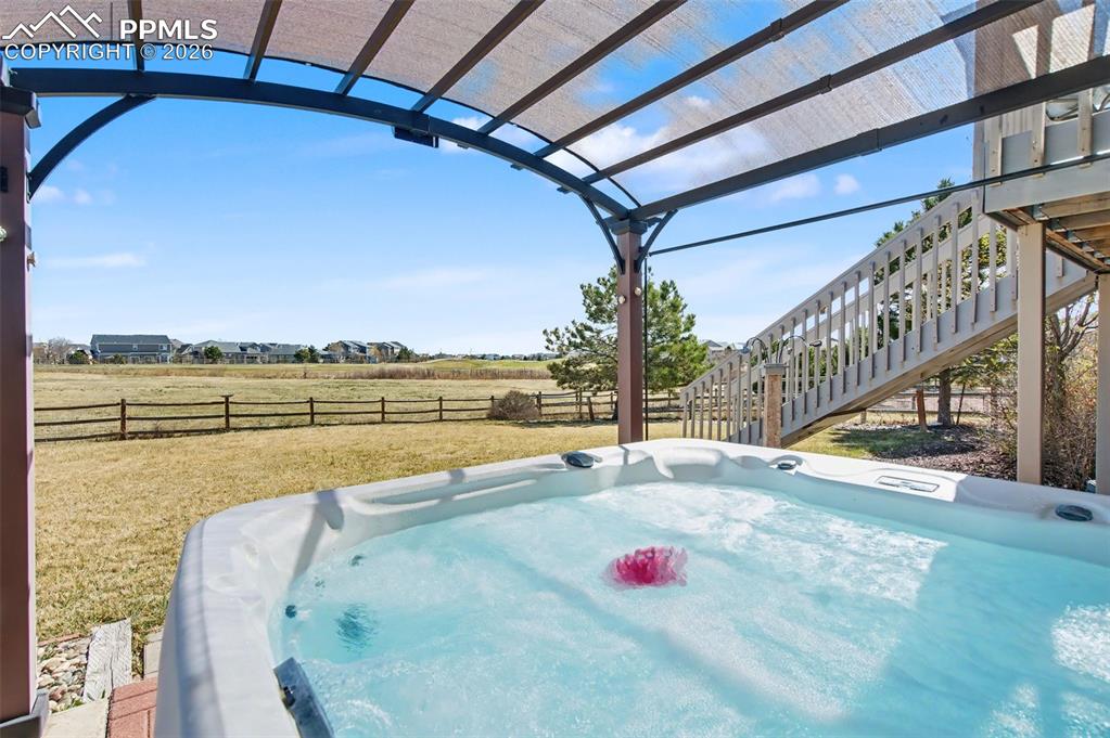 Image 48 of 48: Hot tub and shade cover included