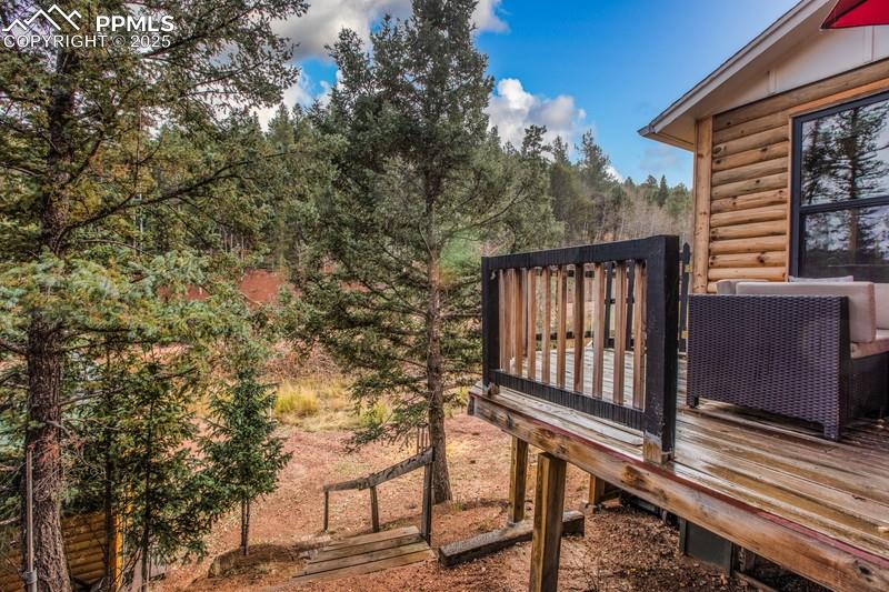 Image 6 of 27: View of yard featuring a deck