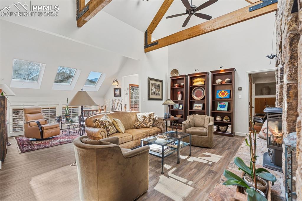 Image 10 of 46: Living Room and Solarium