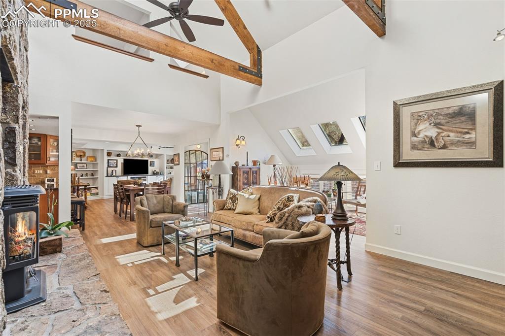 Image 11 of 46: Living Room, Dining Room, and Solarium