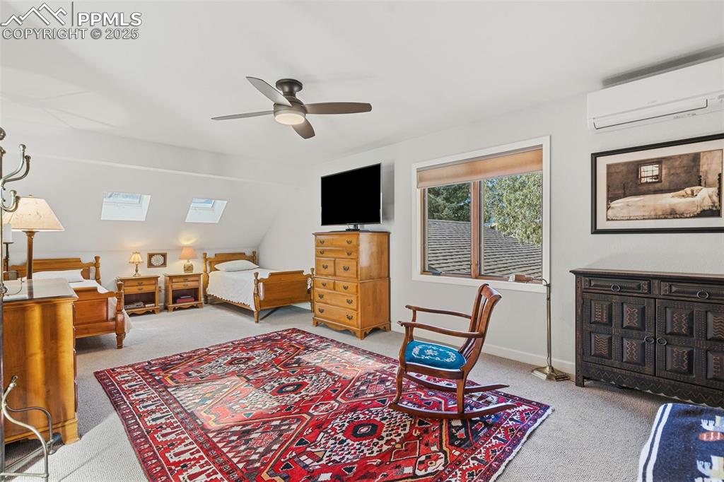 Image 27 of 46: Upstairs bedroom has mountain views
