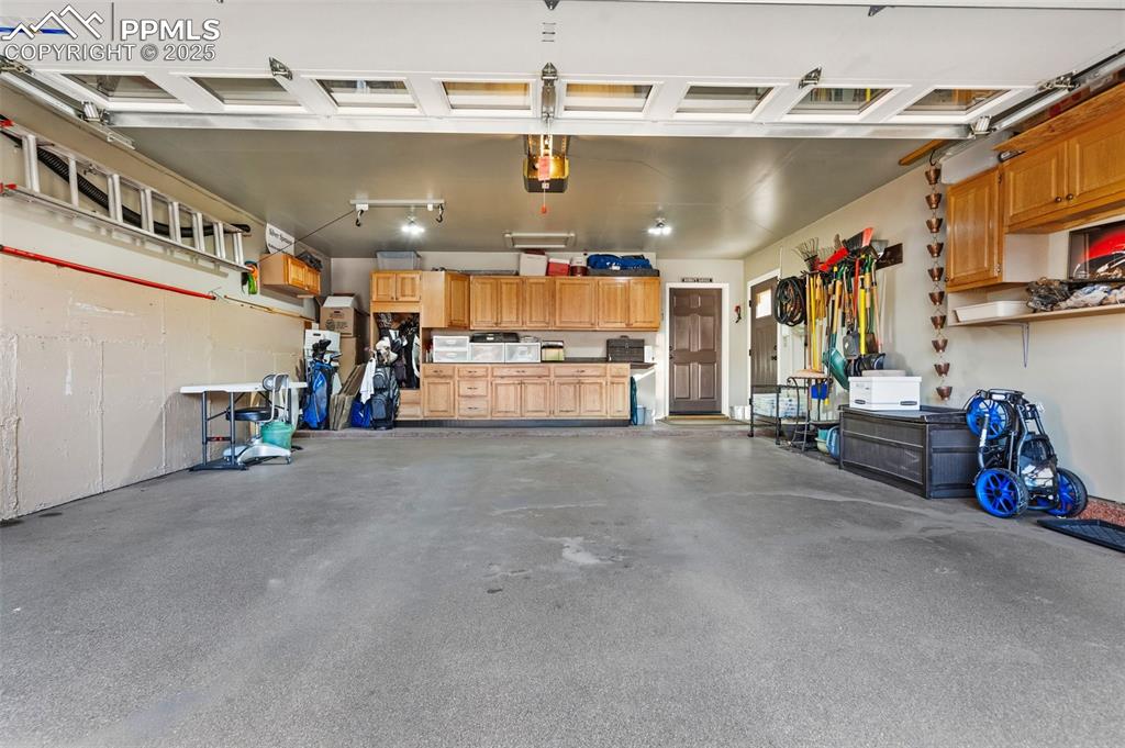 Image 30 of 46: Epoxy floor in the garage