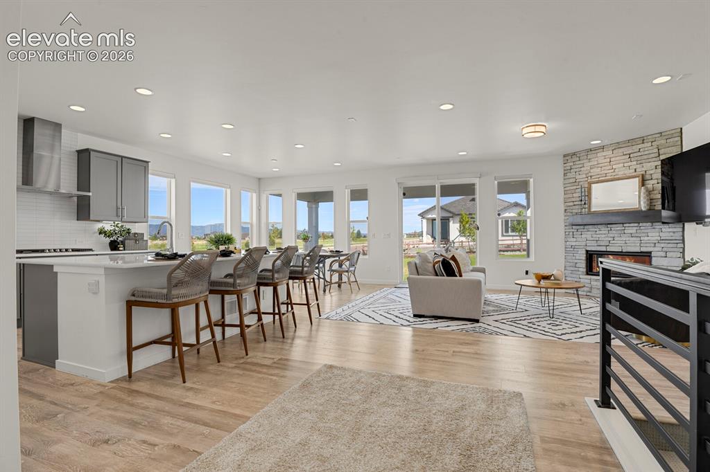 Image 10 of 44: Open concept and lots of windows bringing in so much natural light.