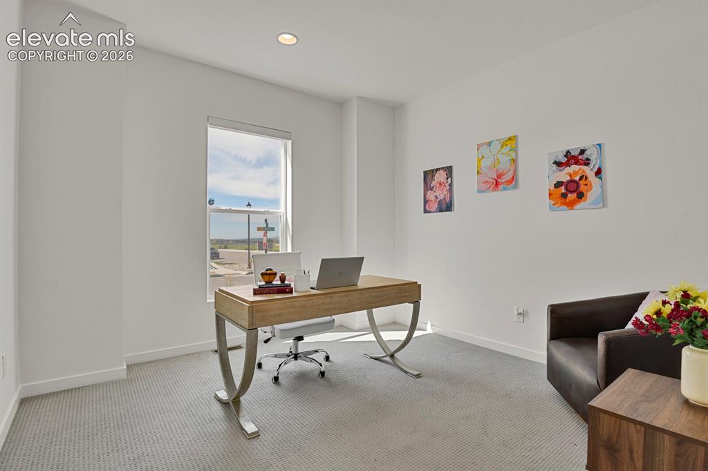 Image 26 of 44: This is the 2nd bedroom on therein level that could also be used as an offi