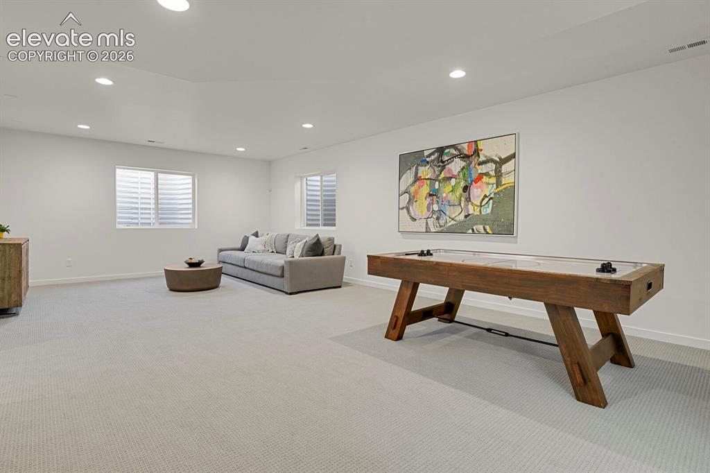 Image 30 of 44: Basement area could be used for a rec room, movie room or whatever you envi