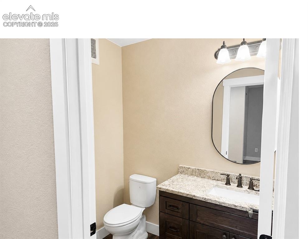 Image 28 of 40: Powder Bath Main Level
