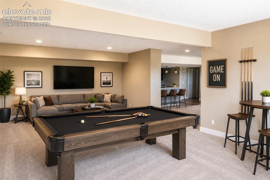Image 35 of 40: Virtually staged basement Recreational room featuring a wood-finish pool ta