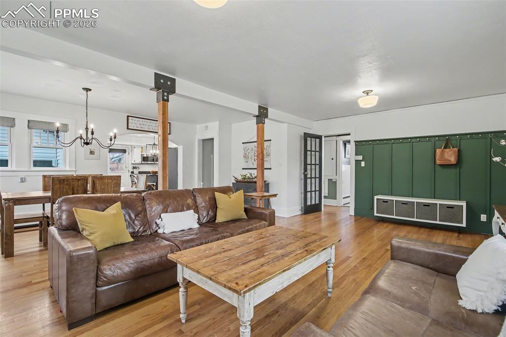 Image 3 of 37: Wood floors and beamed ceiling