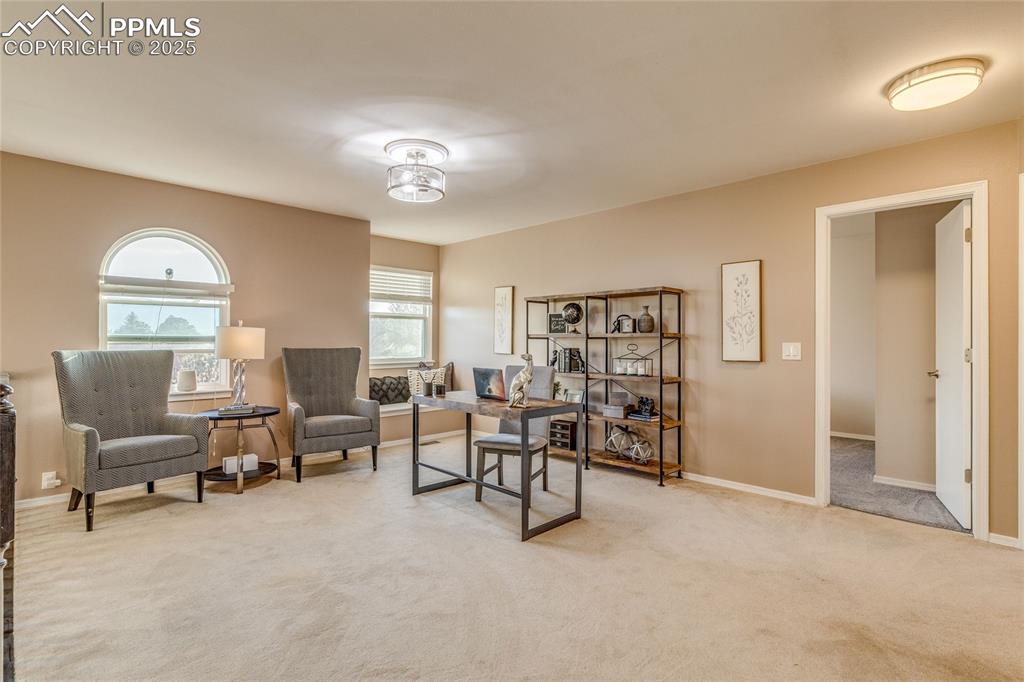 Image 9 of 31: Large open loft that can be an office, a living area or a toy area for the