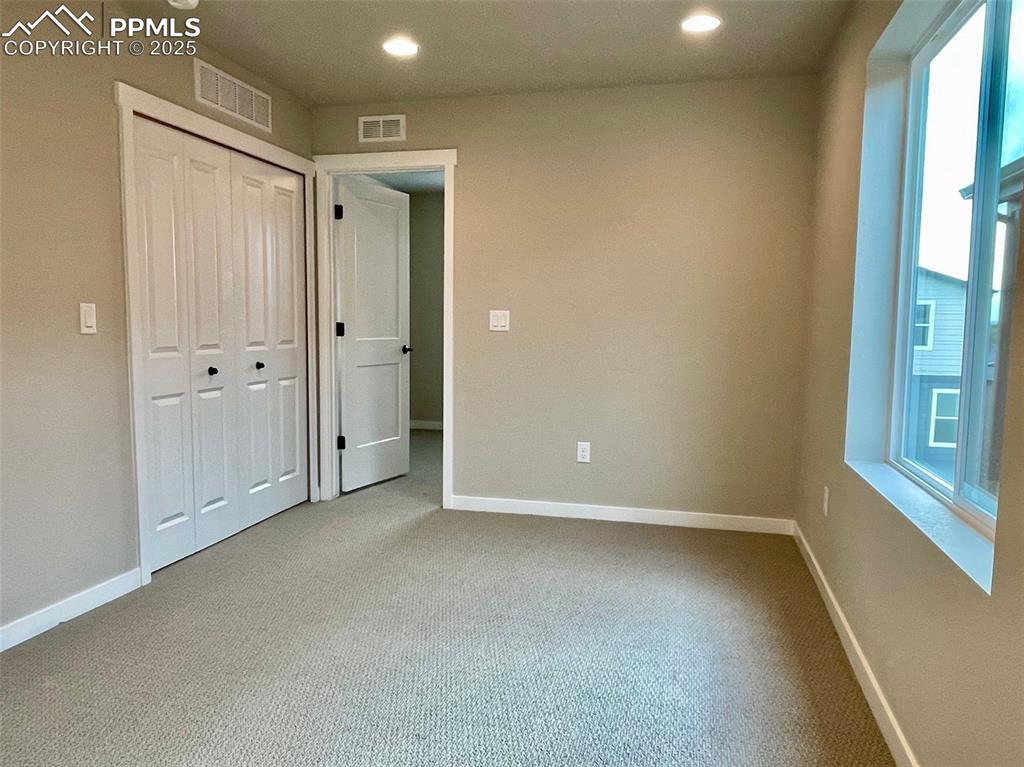 Image 14 of 33: Bedroom