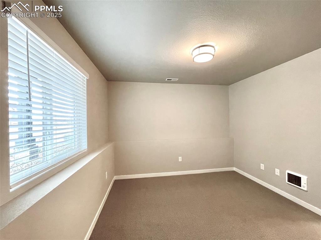 Image 22 of 33: Bedroom