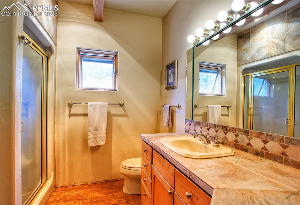 Image 14 of 20: Other master bath with attached walk in closet.