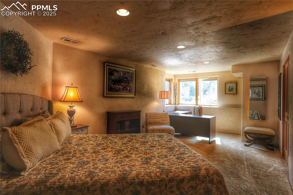Image 17 of 20: Lower level ensuite for guests. Lots of storage, full bath and a "vault" st