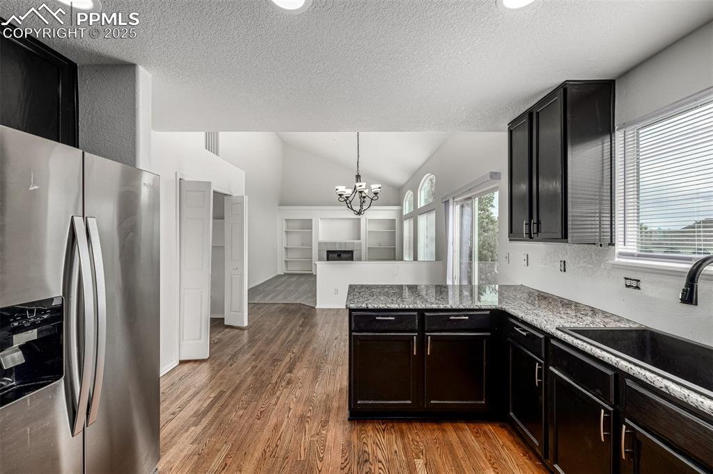 Image 10 of 35: Open to the living room, everyone can be together. 