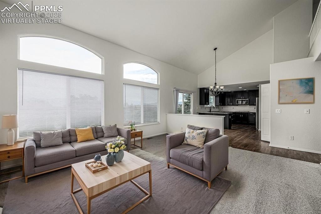 Image 14 of 35: Entertaining is a breeze in this open and spacious main level. VIRTUALLY ST