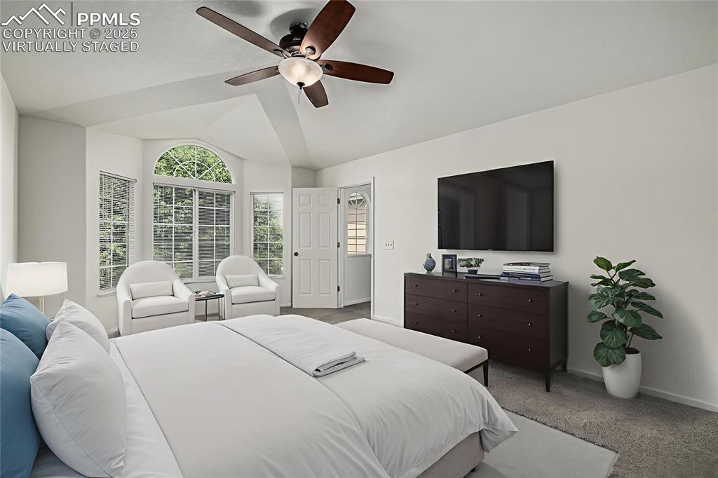 Image 16 of 35: Relax after a long day in your spacious primary retreat. VIRTUALLY STAGED