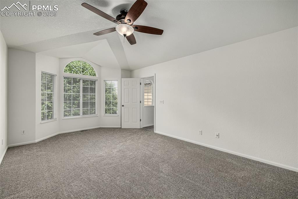 Image 17 of 35: Relax after a long day in your spacious primary retreat.