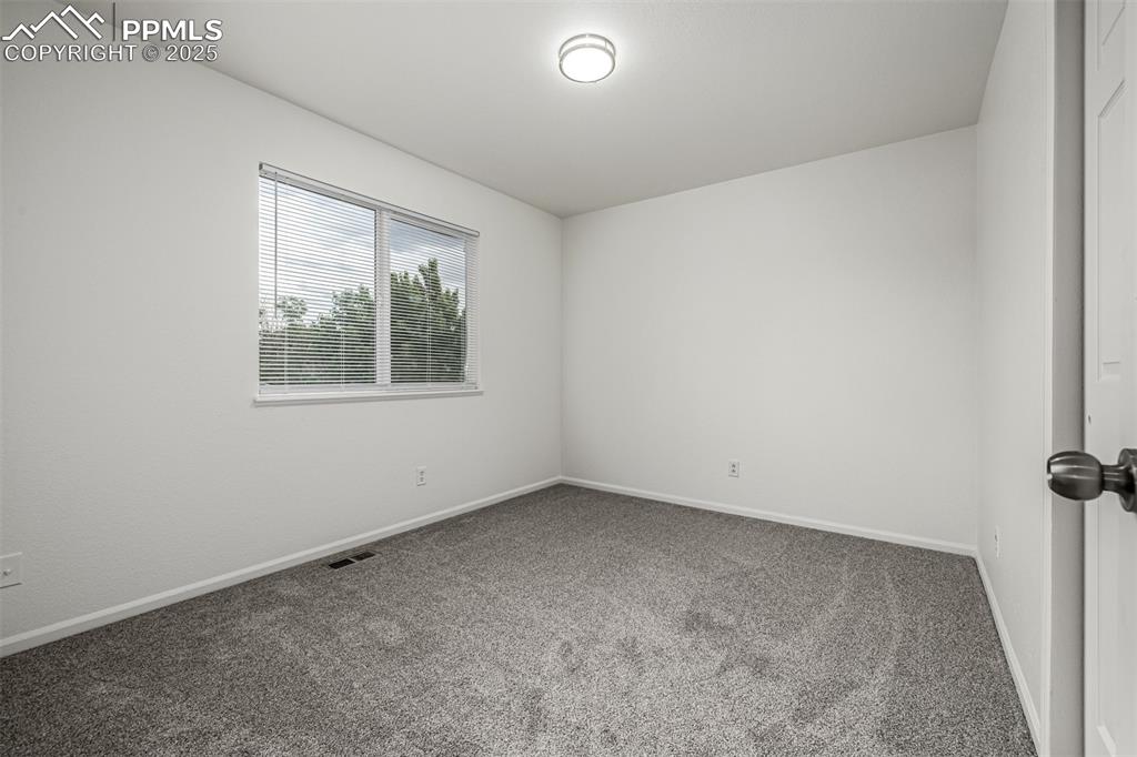 Image 22 of 35: Upstairs Secondary Bedroom