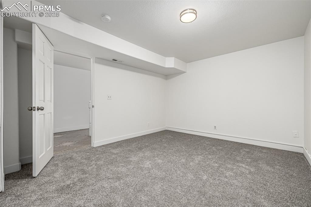 Image 24 of 35: Basement Secondary Bedroom