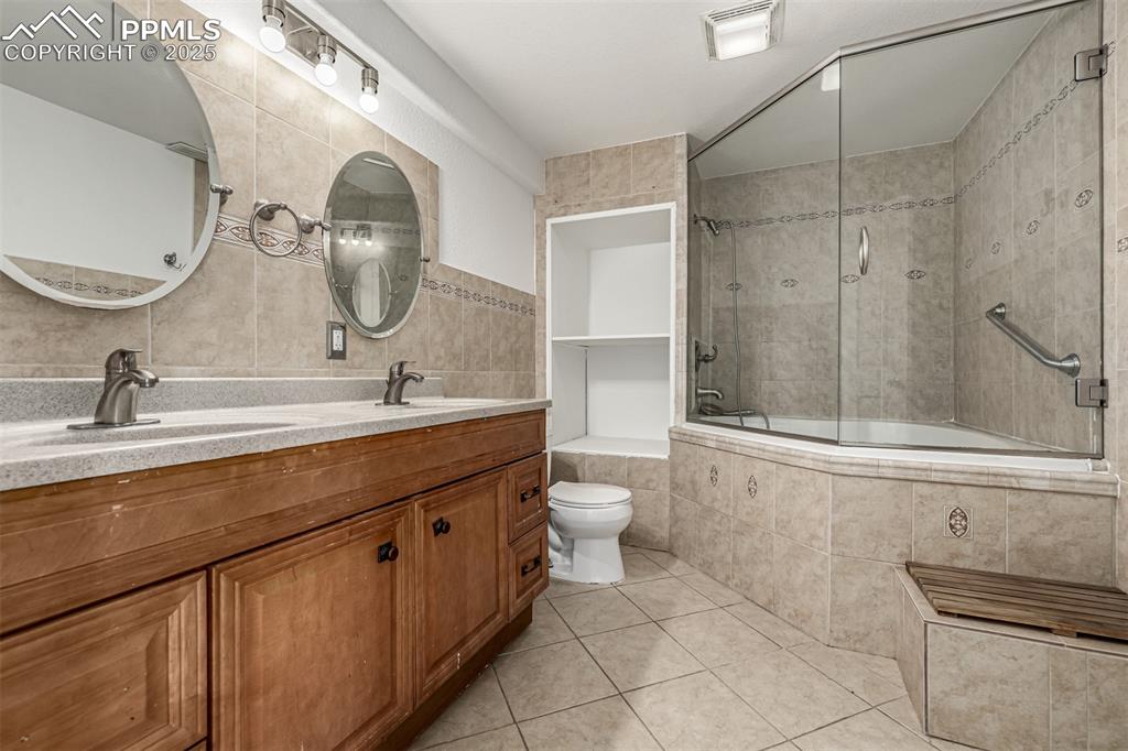 Image 28 of 35: Full basement bathroom