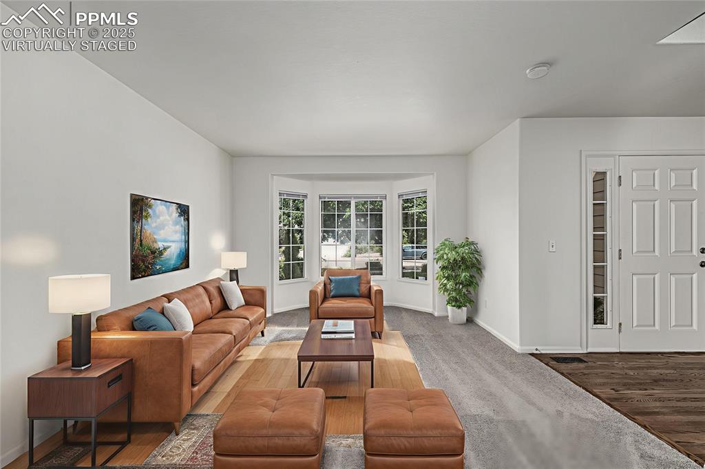 Image 3 of 35: The formal living room is perfect for entertaining - VIRTUALLY STAGED