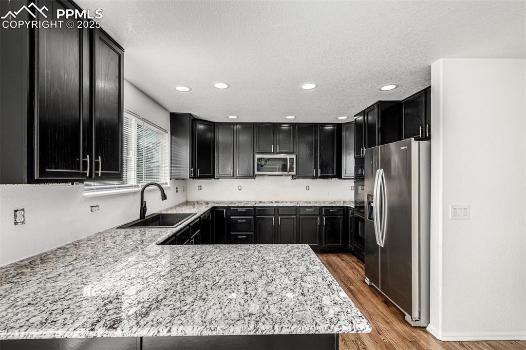 Image 7 of 35: The updated kitchen is sure to please!