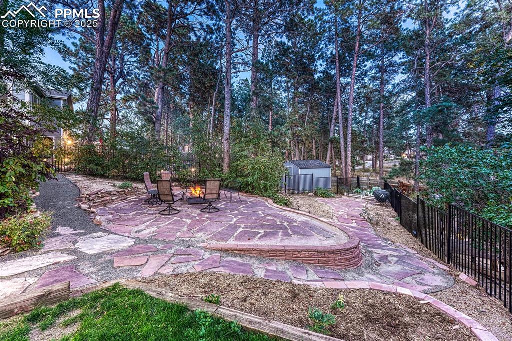 Image 14 of 48: Flagstone patio and additional area for gardening and composter is included