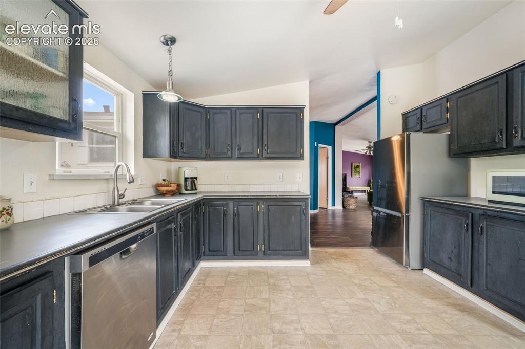 Image 14 of 50: Kitchen with dining area