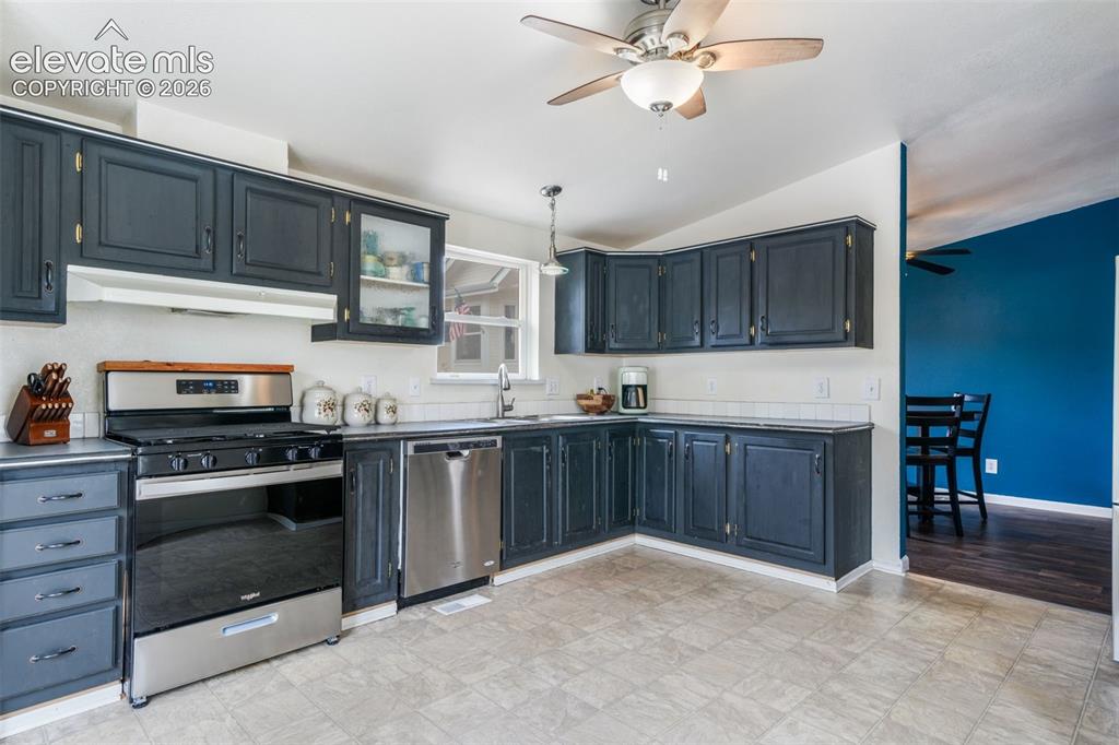 Image 16 of 50: Kitchen with pantry and dining area
