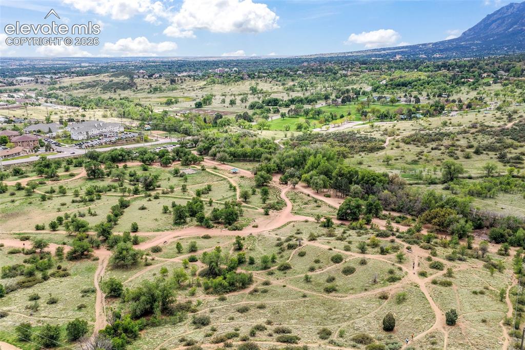 Image 40 of 50: Aerial perspective showcasing varied residential architecture including mul